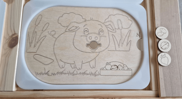 Le cochon avec ses 3 jetons inclus